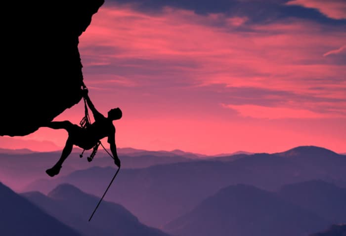 Mountain Climber at sunrise