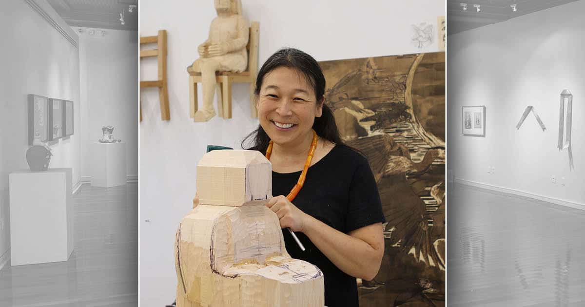 Sachiko Akiyama carving wood in her studio