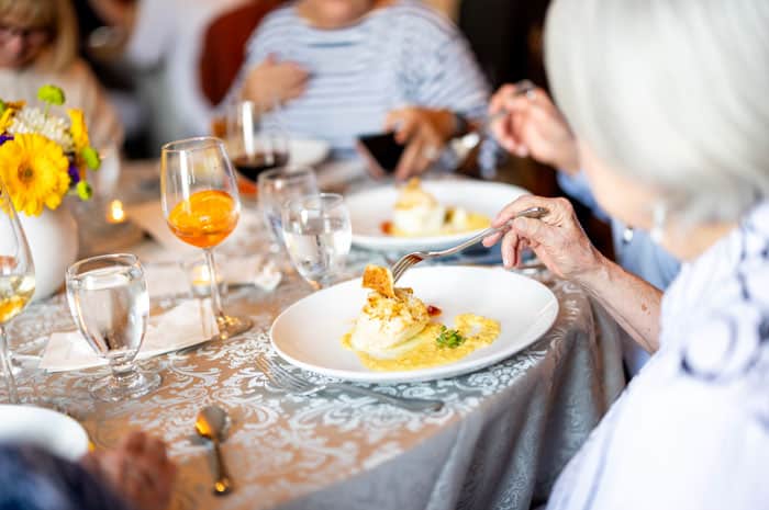 A woman eating dinner