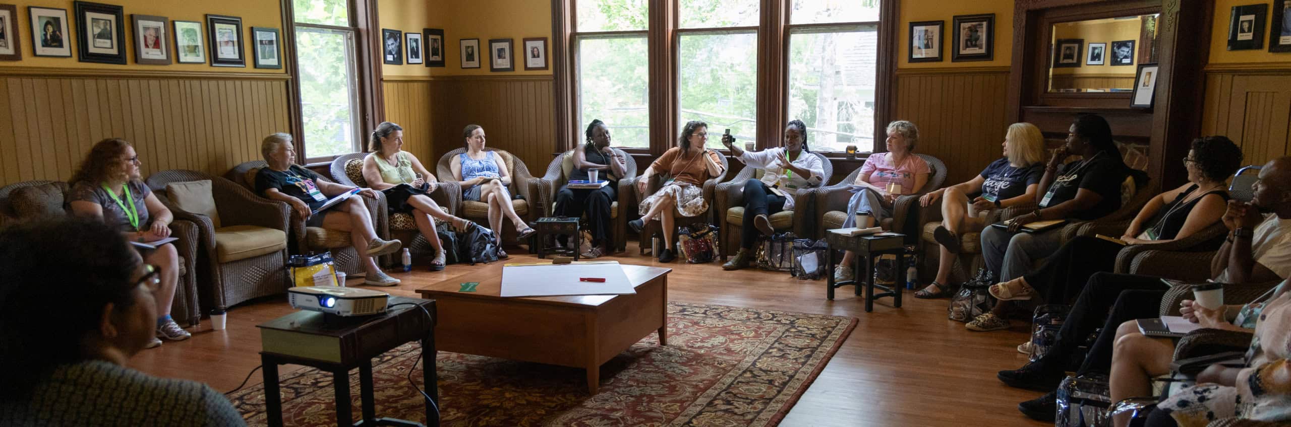 People sitting in a circle during a writing workshop