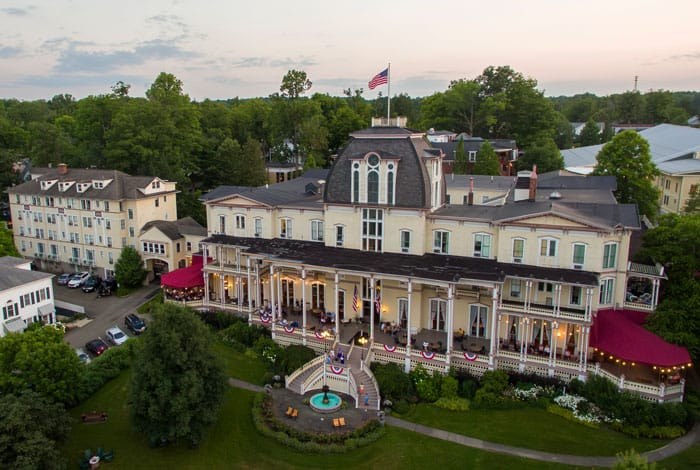 An aerial view of the Athenaeum Hotel at golden hour