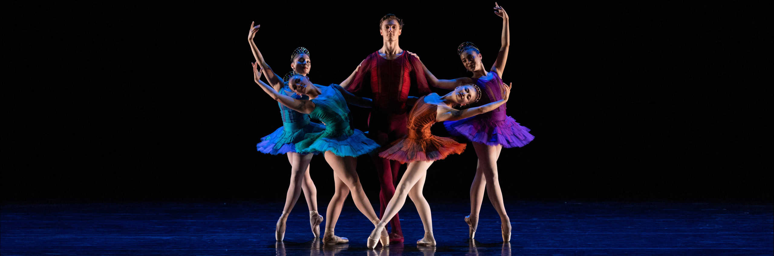 Five dancers on stage